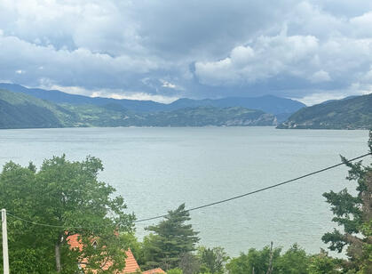 Danube River View 993rkmโ Donji Milanovac, Serbia Scenic view of the Danube River near Donji Milanovac, Serbia, with hills and clouds